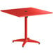 a red table with a black round top