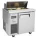 A Turbo Air refrigerated sandwich prep table with a stainless steel top.