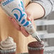 a cupcake with frosting on top