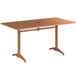 A brown Lancaster Table & Seating rectangular outdoor table with metal legs.