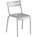 A white metal chair with a backrest.