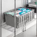 A grey Lavex plastic container with white and blue boxes inside.
