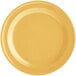 An Acopa Foundations yellow melamine plate with a white border.