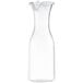 A clear polycarbonate bottle with a white hinged lid.