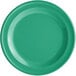 A close up of a green Acopa Foundations narrow rim melamine plate.