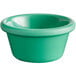 A close up of a green Acopa Foundations smooth melamine ramekin.