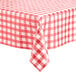 A red and white checkered Choice vinyl table cover on a table.