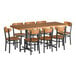 A Lancaster Table & Seating wood butcher block table with 8 chairs.