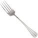 A Walco Parisian stainless steel table fork with a silver handle.