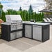 A Crown Verity built-in grill on a counter in an outdoor kitchen.