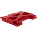 A red plastic Cambro connector with two holes.