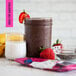 The white and pink Pitaya Foods wrapper for an organic acai berry smoothie pack.