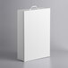 A white rectangular Medique first aid cabinet box with a handle.