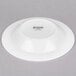 An Arcoroc Zenix glass bowl with a white rim.