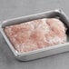 Warrington Farm Meats raw sweet Italian turkey sausage in a metal pan.