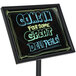 A black Aarco single pedestal sign with white writing that says "Come on in for some great deliveries" and neon markers.