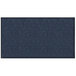 A close-up of a navy blue rectangular rug with a chevron pattern.