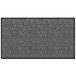 A grey rectangular doormat with a black chevron border.