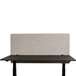 A black Luxor desk with a grey RECLAIM privacy panel.