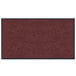 A red Lavex Plush Dilour entrance mat with black trim.