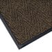 A brown Lavex carpet entrance mat with a chevron pattern and black trim.