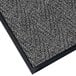 A gray Lavex carpet mat with a chevron pattern and black trim.