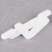 A Ketchum Manufacturing white plastic number 4 deli tag insert.