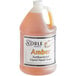 A bottle of Noble Chemical amber liquid antibacterial hand soap on a counter.