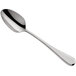 An Amefa stainless steel dessert spoon with a silver handle and spoon.