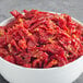 A white bowl of Del Destino sundried tomato strips.