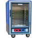 A blue and silver Metro C5 heated holding and proofing cabinet with a glass door.