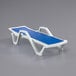 A white chaise lounge with a blue sling seat.