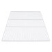 A white metal grid shelf for True refrigerators.
