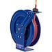 A blue Coxreels hose reel with a high pressure hose attached.