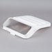 A white plastic box with a clear lid.