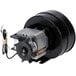 A black round electric motor with a black round wheel and cords.