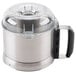 A Robot Coupe stainless steel cutter bowl kit with a black lid.