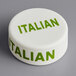 a white round object with green text