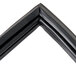 A black door gasket with white corners.