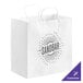 A white paper shopping bag with handles and black customizable text that says "Sandbar"
