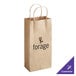 A natural Kraft paper shopping bag with handles and black text.