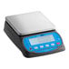 An AvaWeigh PCN10 portion scale on a counter with a blue digital display.