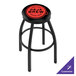 A black Holland Bar Stool with a red and black logo on the padded seat.