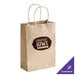 A brown paper bag with handles.