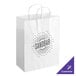 A white paper shopping bag with handles and black text reading "Sandbar"