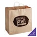 A brown paper bag with white text that reads "Orange Kiwi" with handles.