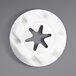 A white circular Carpigiani nozzle with a star cutout.