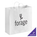 A white shopping bag with black text that says "Forge"