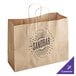 A brown paper bag with the sandbar logo on it.