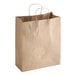 A brown natural kraft paper bag with handles.